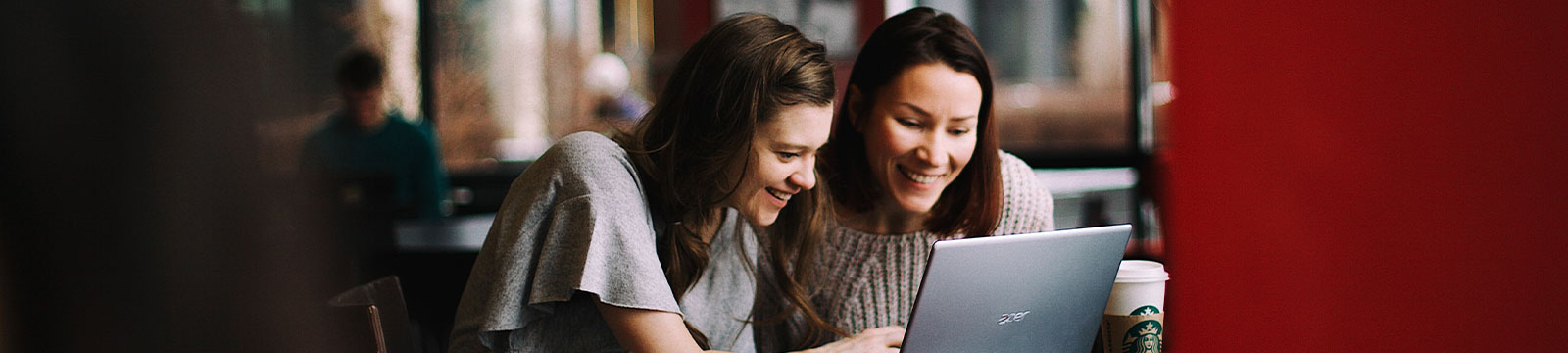 Two girls on a laptop.