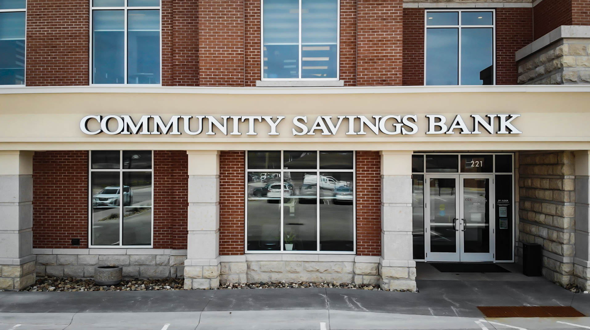 An image of the Community Savings Bank sign on one of their buildings.